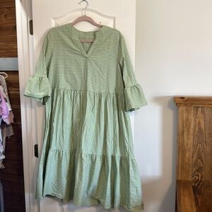 Green and white stripped midi dress
Not tagged but would say it’s size Large